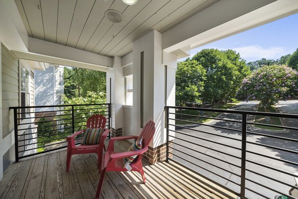 Modern patio area with outdoor seating at Concord Apartments, ideal for relaxation and gatherings