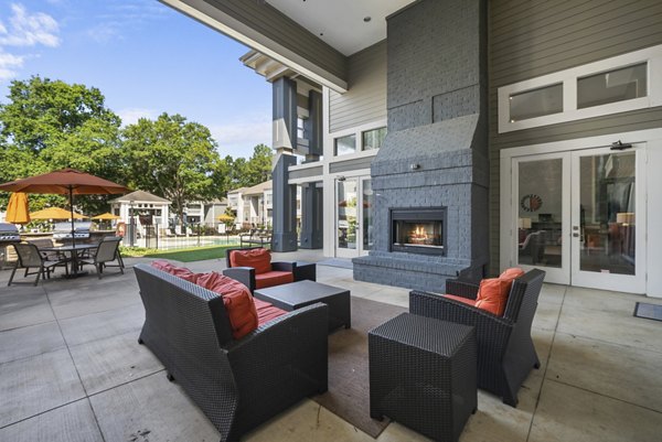 Cozy fire pit seating area at Concord Apartments