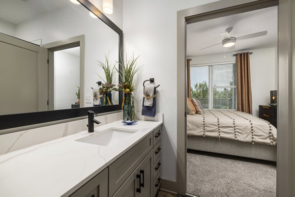 Luxurious bathroom with sleek fixtures at The Easley Apartments, offering premium living in Greystar luxury apartments