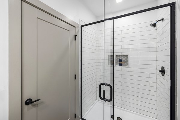 Modern bathroom with sleek fixtures at The Easley Apartments