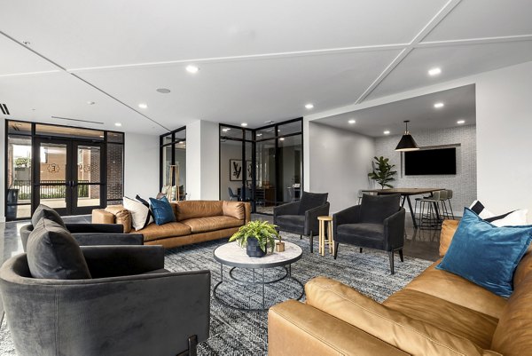 Clubhouse featuring modern design and social spaces at The Easley Apartments