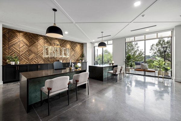 Clubhouse featuring modern design and comfortable seating at The Easley Apartments, a luxury community by Greystar