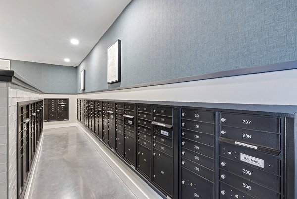 Mail room with secure package lockers at The Easley Apartments