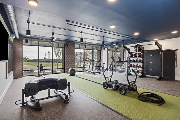 Modern fitness center with state-of-the-art equipment at The Easley Apartments