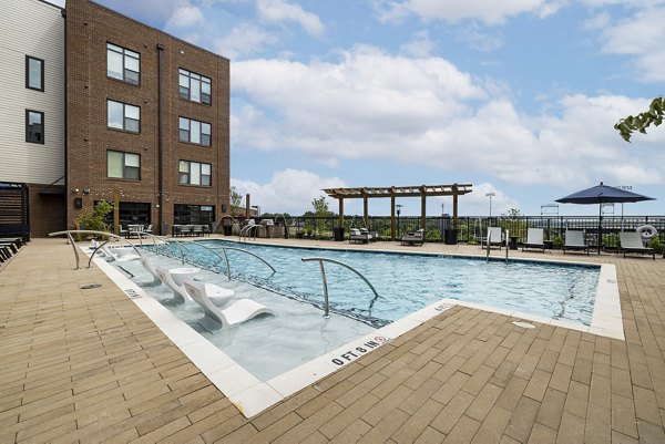 Rooftop pool with city views at The Easley Apartments