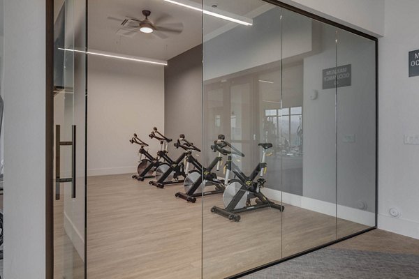 Yoga/spin studio with modern equipment at The Heights at Legend Hills Apartments