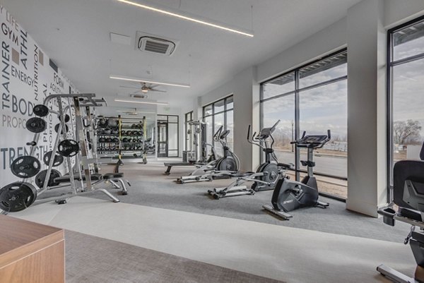 State-of-the-art fitness center featuring modern equipment at The Heights at Legend Hills Apartments