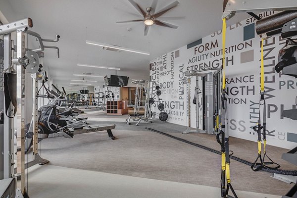 Modern fitness center with state-of-the-art equipment at The Heights at Legend Hills Apartments