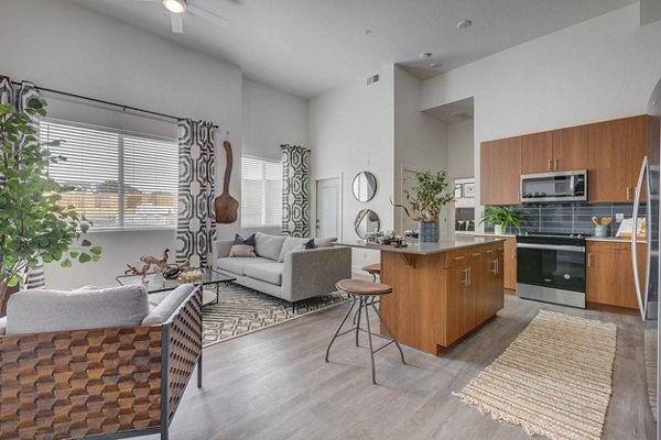 Elegant kitchen with stainless steel appliances in The Heights at Legend Hills Apartments