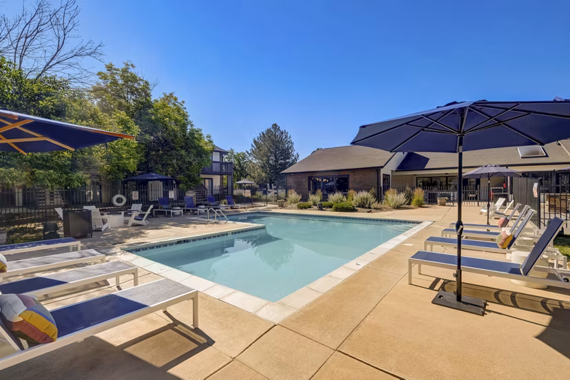 Rooftop pool with city skyline views at Shift Apartments