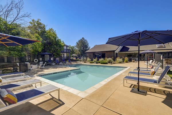 Rooftop pool with city skyline views at Shift Apartments