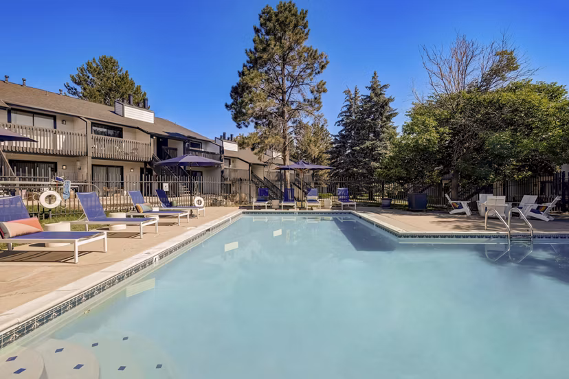 Modern pool with lounge chairs at Shift Apartments, a luxury Greystar property in a vibrant urban location