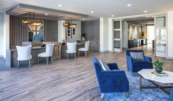 Clubhouse and leasing office with modern design at Prose Hardy Yards Apartments, offering luxury living in a vibrant community