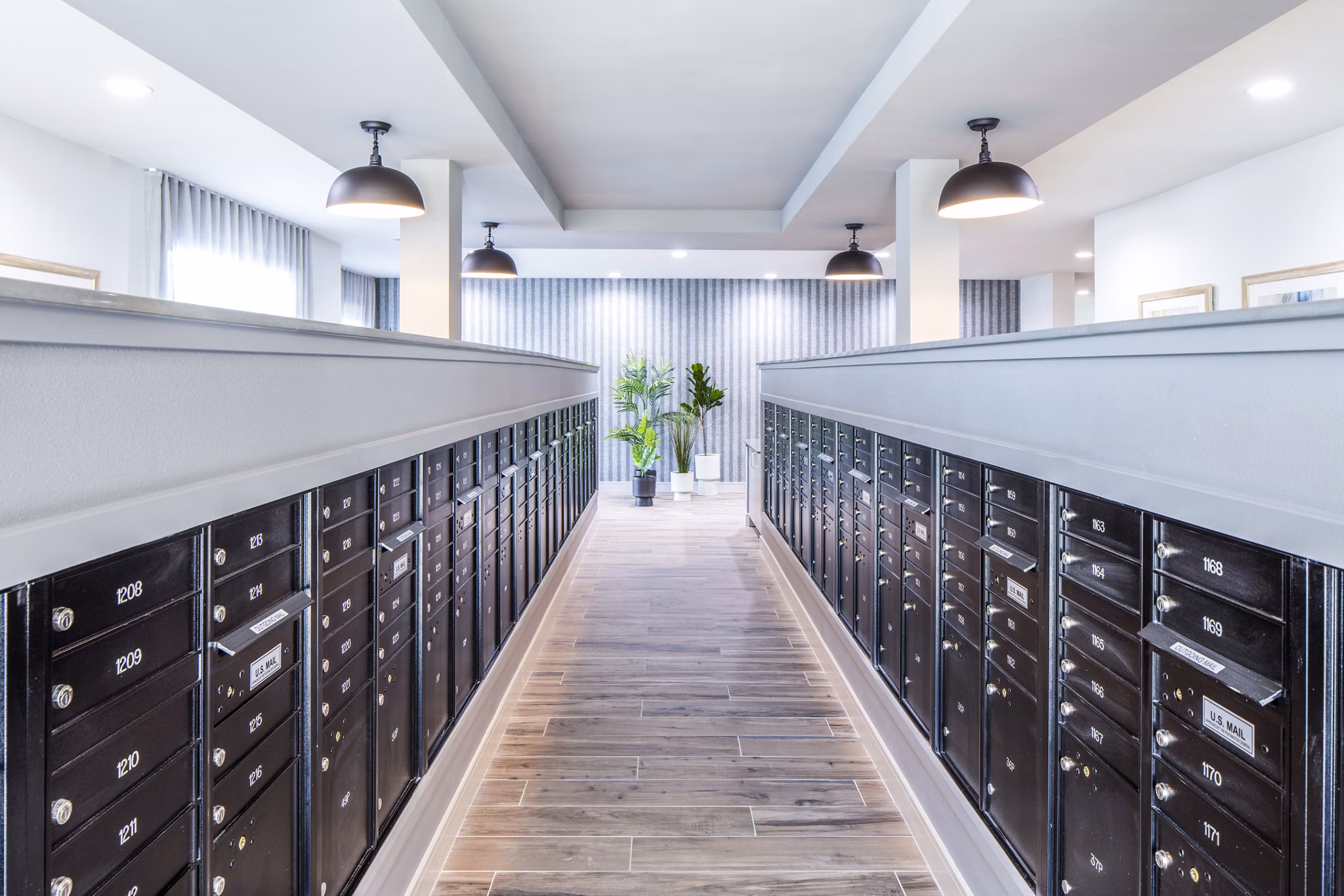 Modern mailroom in the clubhouse at Prose Hardy Yards Apartments
