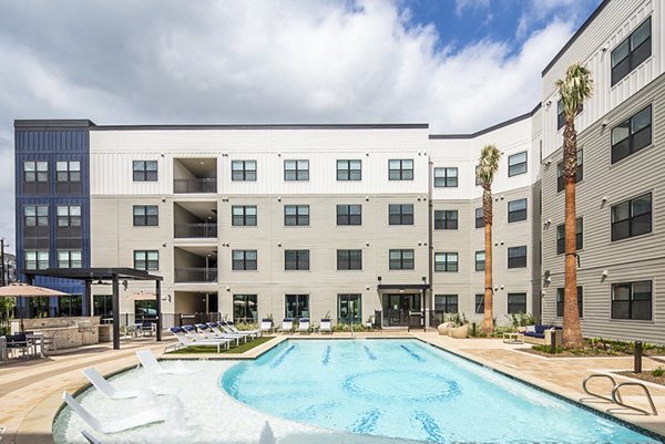 Sparkling outdoor pool at Prose Hardy Yards Apartments