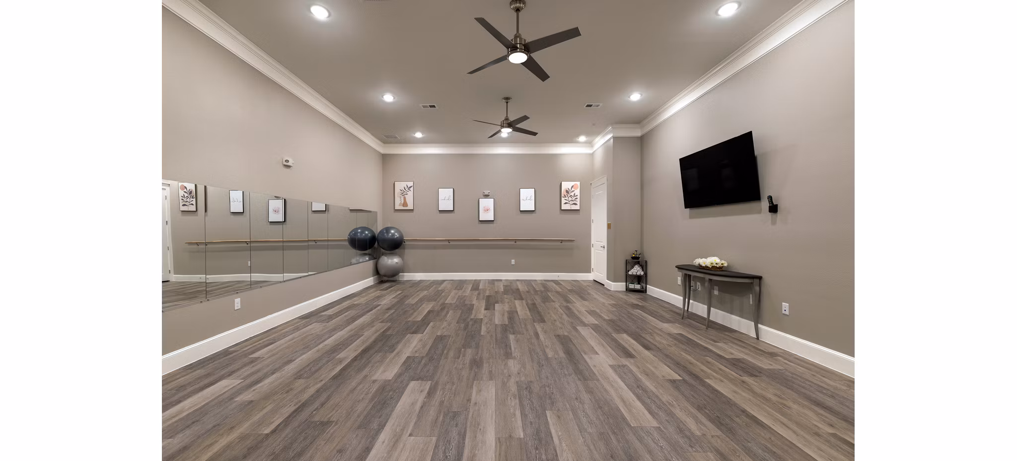 fitness center at Ivy Point Cypress Apartments 