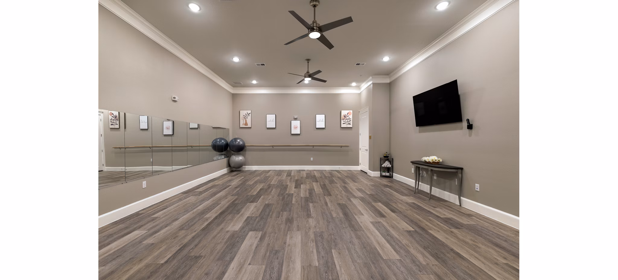 fitness center at Ivy Point Cypress Apartments 