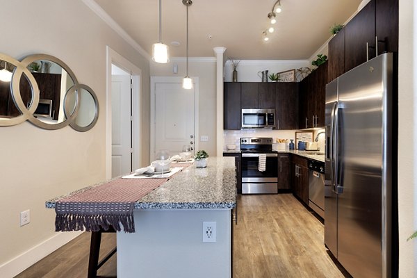 kitchen at Ivy Point Cypress Apartments 