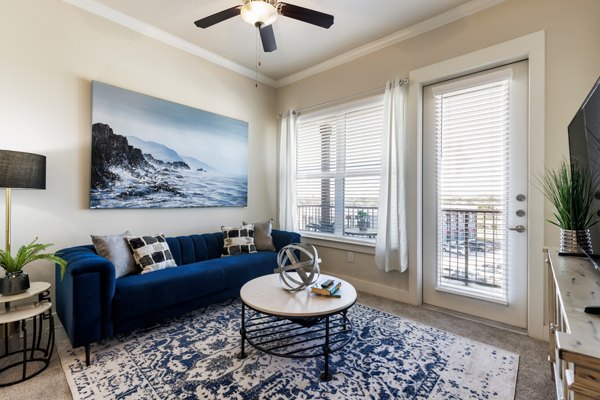 living room at Ivy Point Cypress Apartments 