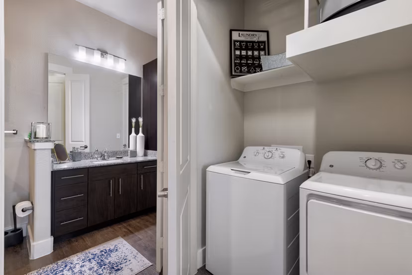 laundry facility at Ivy Point Cypress Apartments 