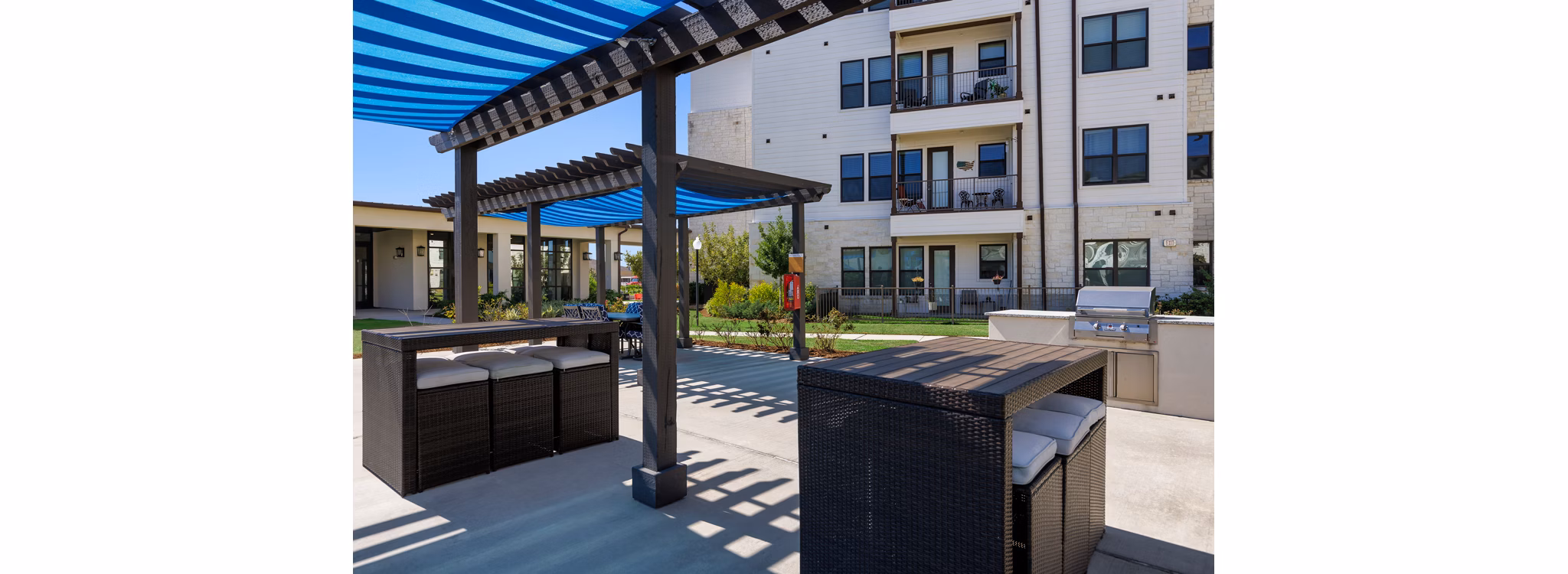 grill area at Ivy Point Cypress Apartments 