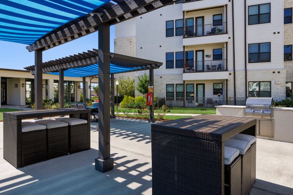 grill area at Ivy Point Cypress Apartments 