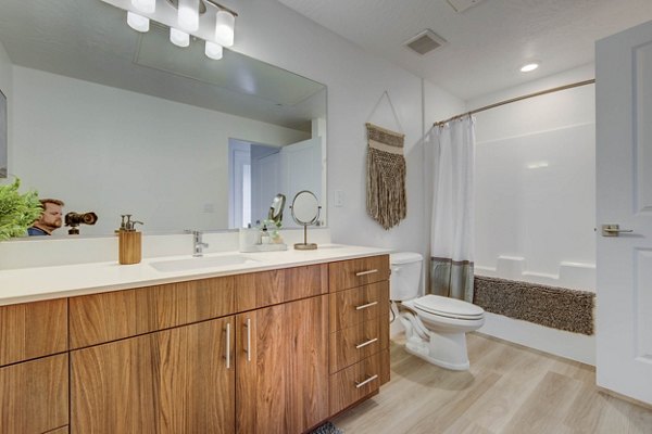 Modern bathroom with marble countertops at Aspire Apartments, luxury living spaces for comfort and style