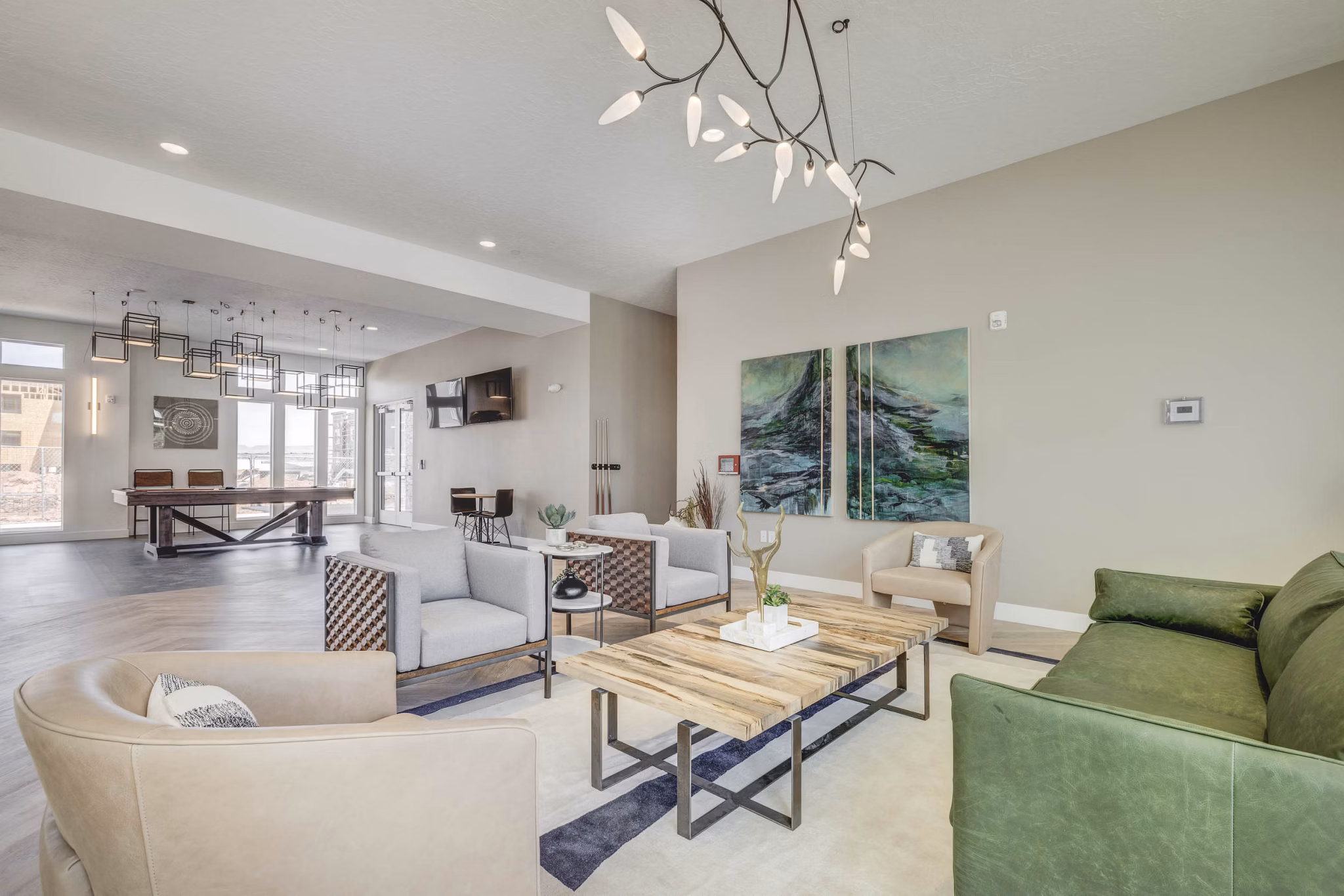 Modern clubhouse with plush seating at Aspire Apartments, ideal for social gatherings and relaxation Greystar luxury apartments offering premium amenities