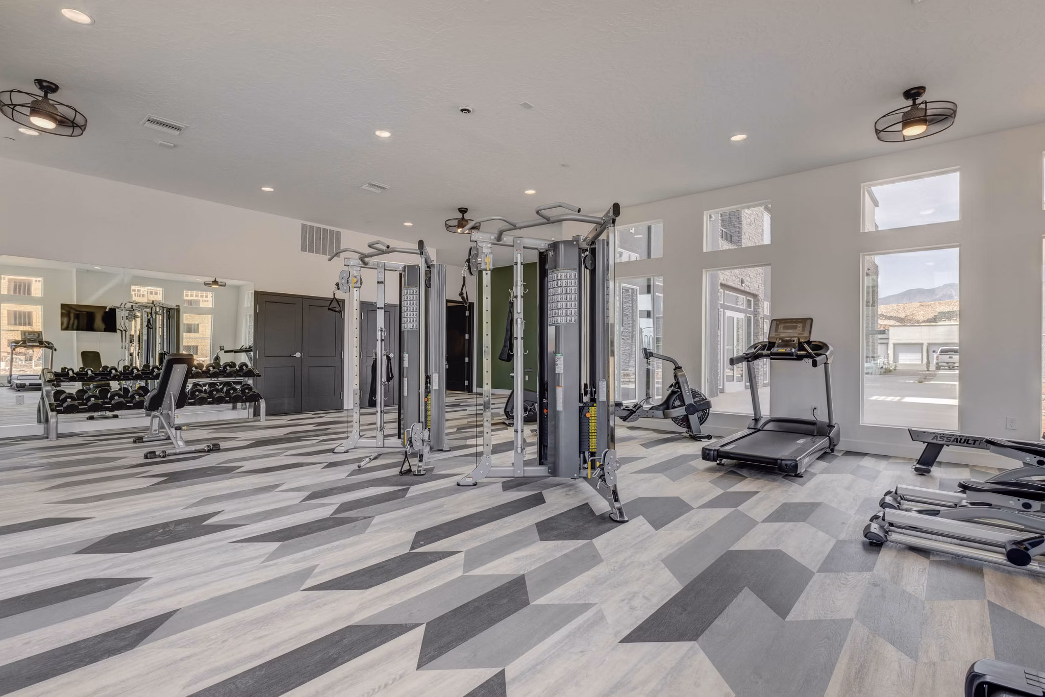 State-of-the-art fitness center at Aspire Apartments offers modern equipment and spacious workout areas for residents
