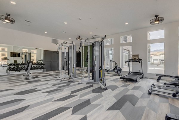 State-of-the-art fitness center at Aspire Apartments offers modern equipment and spacious workout areas for residents