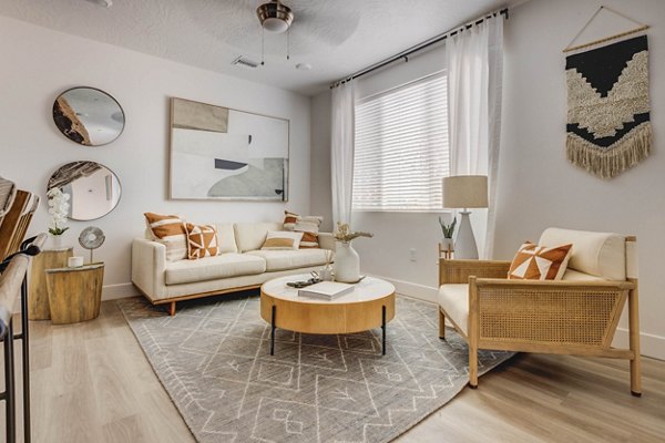 Cozy living room with modern furnishings at Aspire Apartments