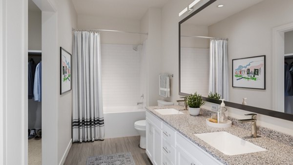 Modern bathroom with sleek fixtures at Citizen House Kyle Apartments