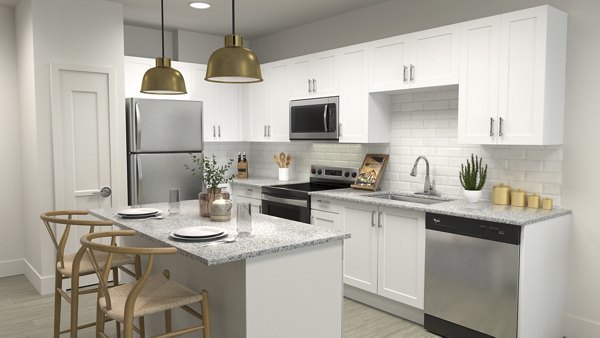 Modern kitchen with granite countertops and stainless steel appliances at Citizen House Kyle Apartments