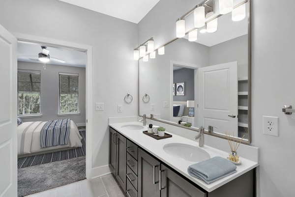 Modern bathroom with sleek fixtures at Aquatera Apartments