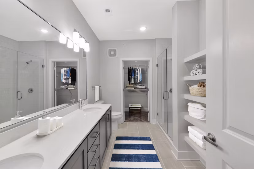 Elegant bathroom featuring modern fixtures at Aquatera Apartments luxury living by Greystar