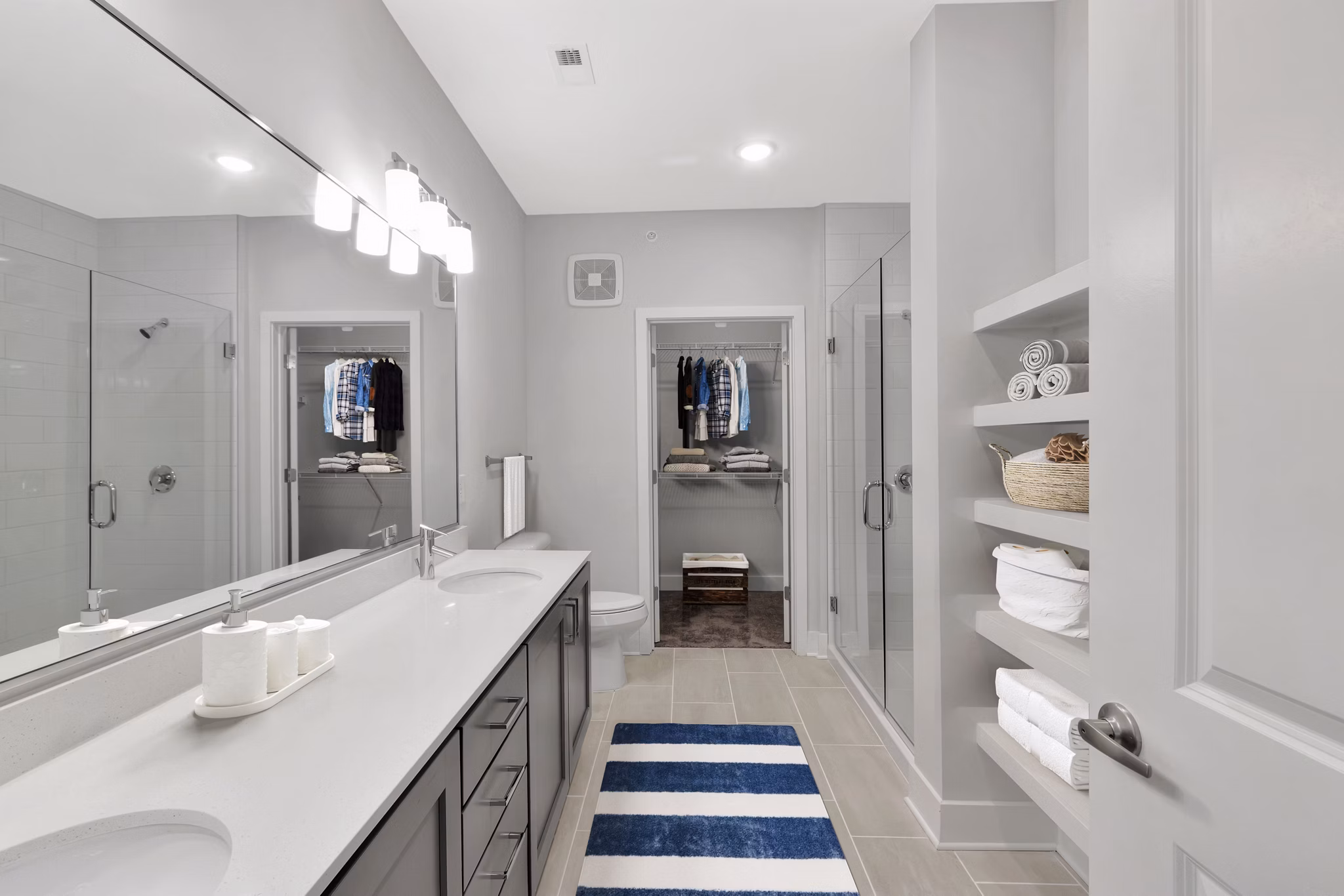 Elegant bathroom featuring modern fixtures at Aquatera Apartments luxury living by Greystar