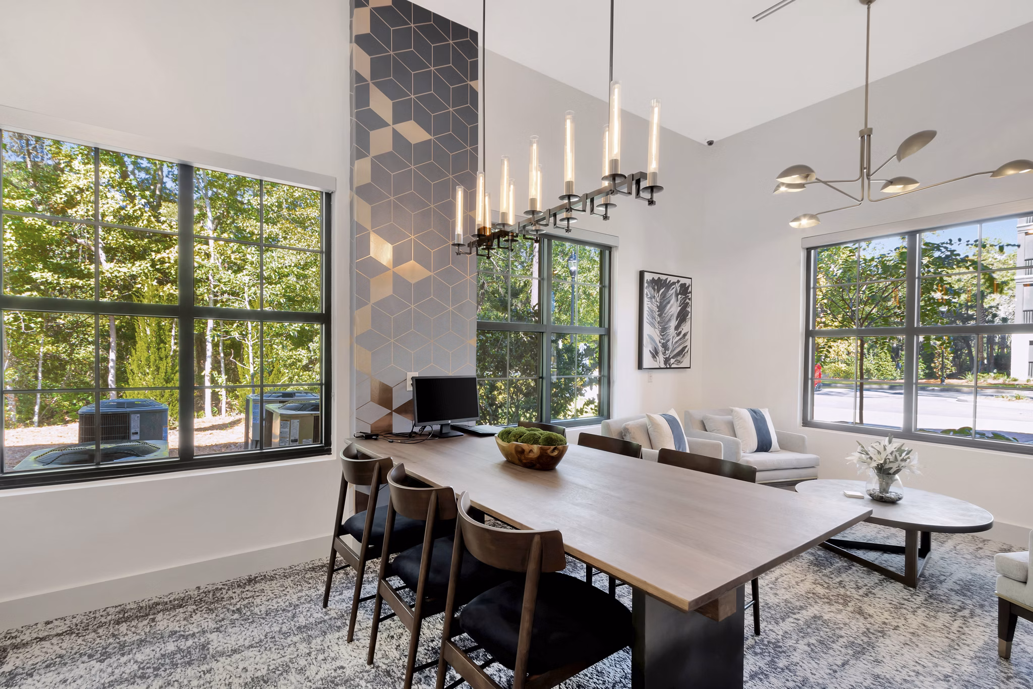 Spacious meeting facility with conference table and chairs at Aquatera Apartments