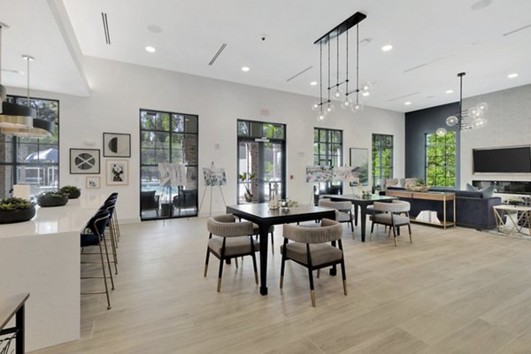 Clubhouse with modern design and ample seating at Aquatera Apartments