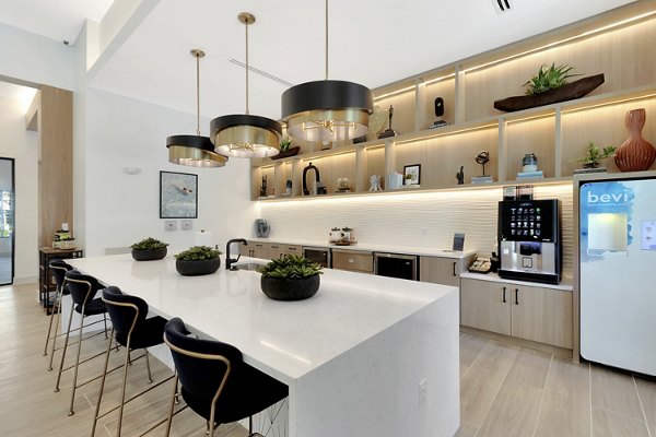 Aquatera Apartments: Elegant clubhouse with modern design and ample seating areas suitable for social gatherings and events
