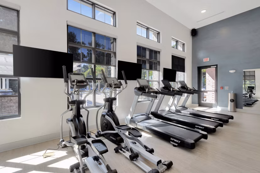 Modern fitness center with cutting-edge equipment at Aquatera Apartments, offering a dynamic space for residents in luxury San Diego community