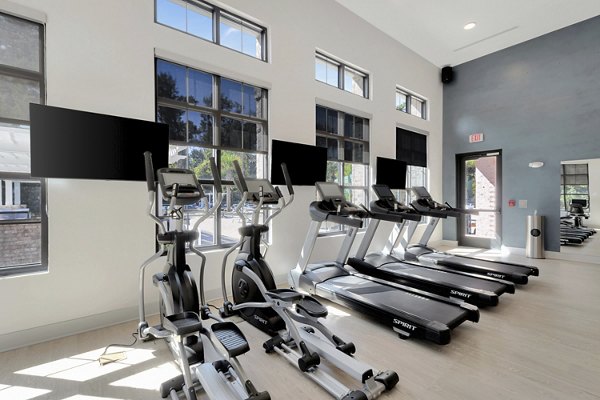 Modern fitness center with cutting-edge equipment at Aquatera Apartments, offering a dynamic space for residents in luxury San Diego community