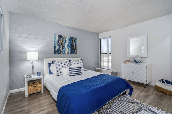 Elegant bedroom with modern decor in Crosstown Phoenix West Apartments
