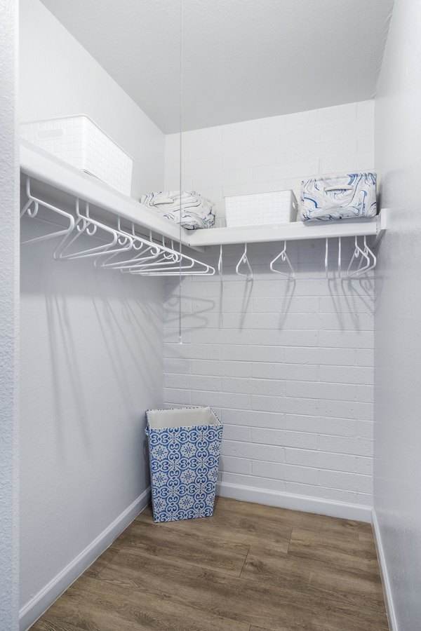 Bedroom closet featuring spacious shelving in Crosstown Phoenix West Apartments