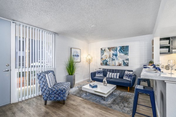 Modern living room with elegant decor at Crosstown Phoenix West Apartments, luxury apartments by Greystar