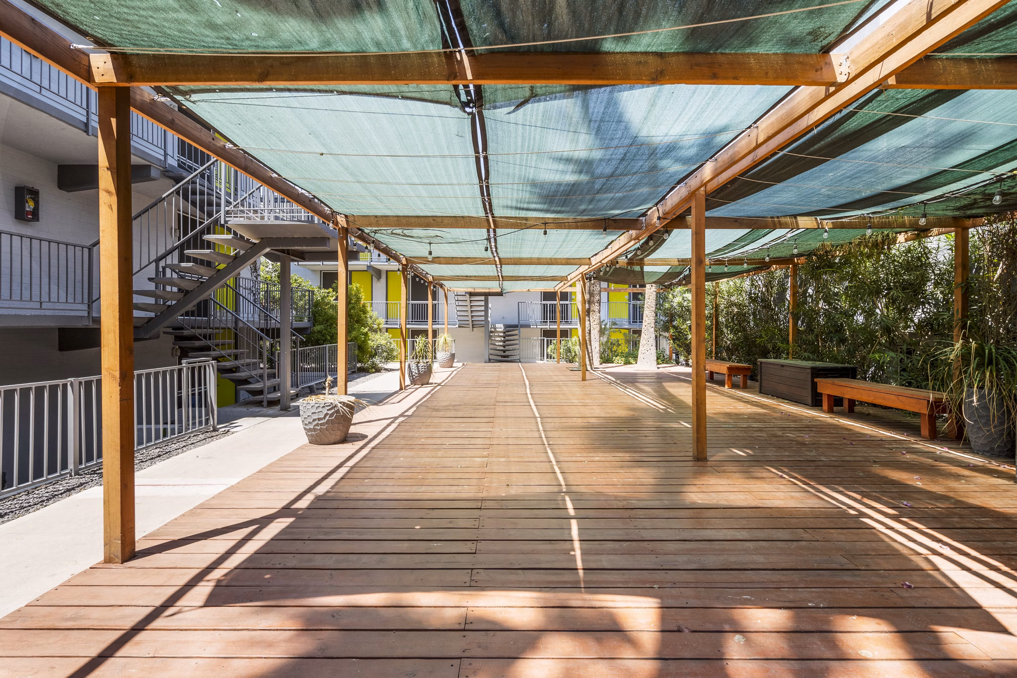 Patio with outdoor seating at Crosstown Phoenix West Apartments featuring scenic views for relaxation and gatherings