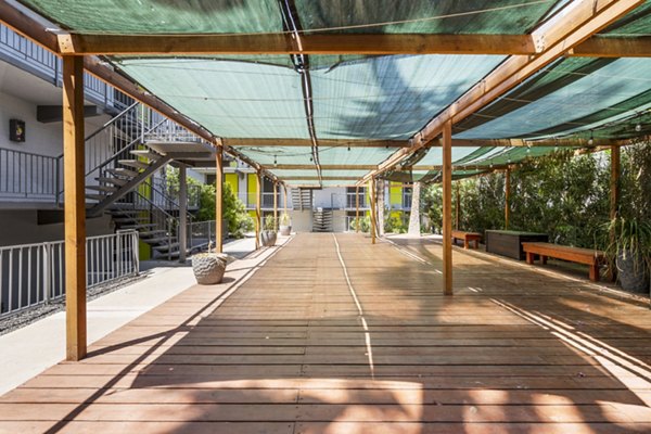 Patio with outdoor seating at Crosstown Phoenix West Apartments featuring scenic views for relaxation and gatherings