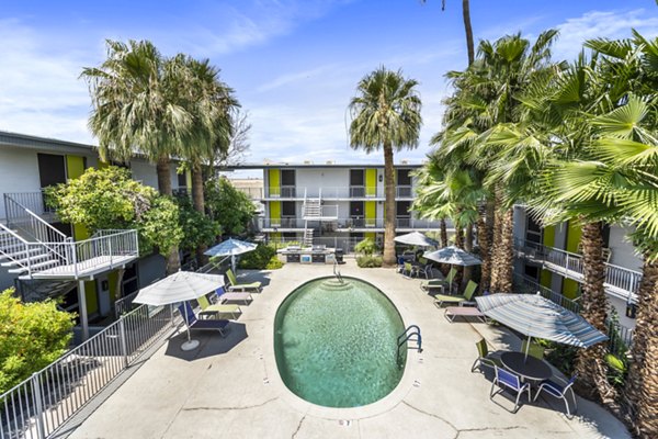 Crosstown Phoenix West Apartments: Luxury pool with sun deck and lounge chairs for relaxation