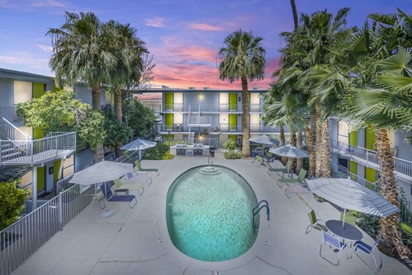 Chic poolside retreat at Crosstown Phoenix West Apartments, featuring serene lounging areas and modern design for a luxury living experience