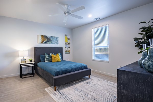 Modern bedroom with sleek design at FLATZ 432 Apartments