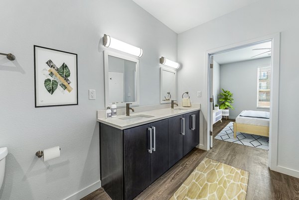 Modern bathroom with sleek design at FLATZ 432 Apartments, featuring luxury amenities and elegant fixtures